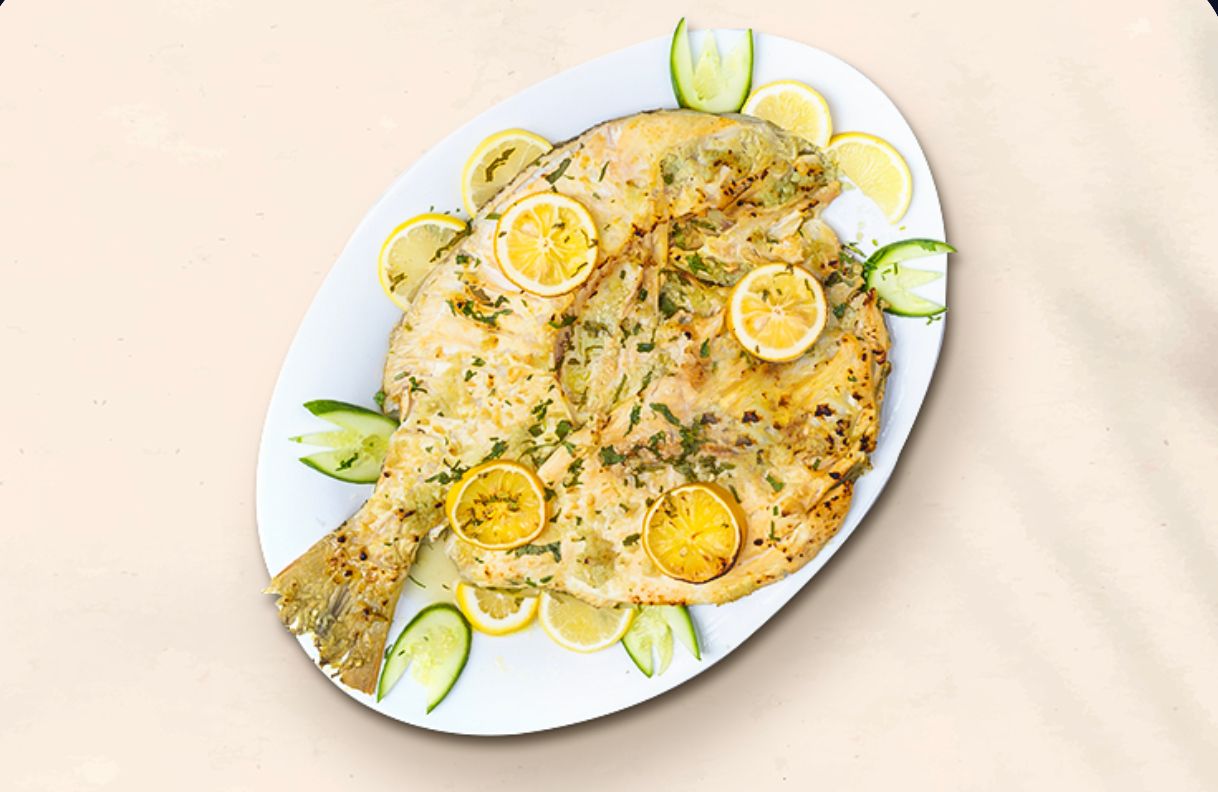 سمك شعور بالثوم والليمون
